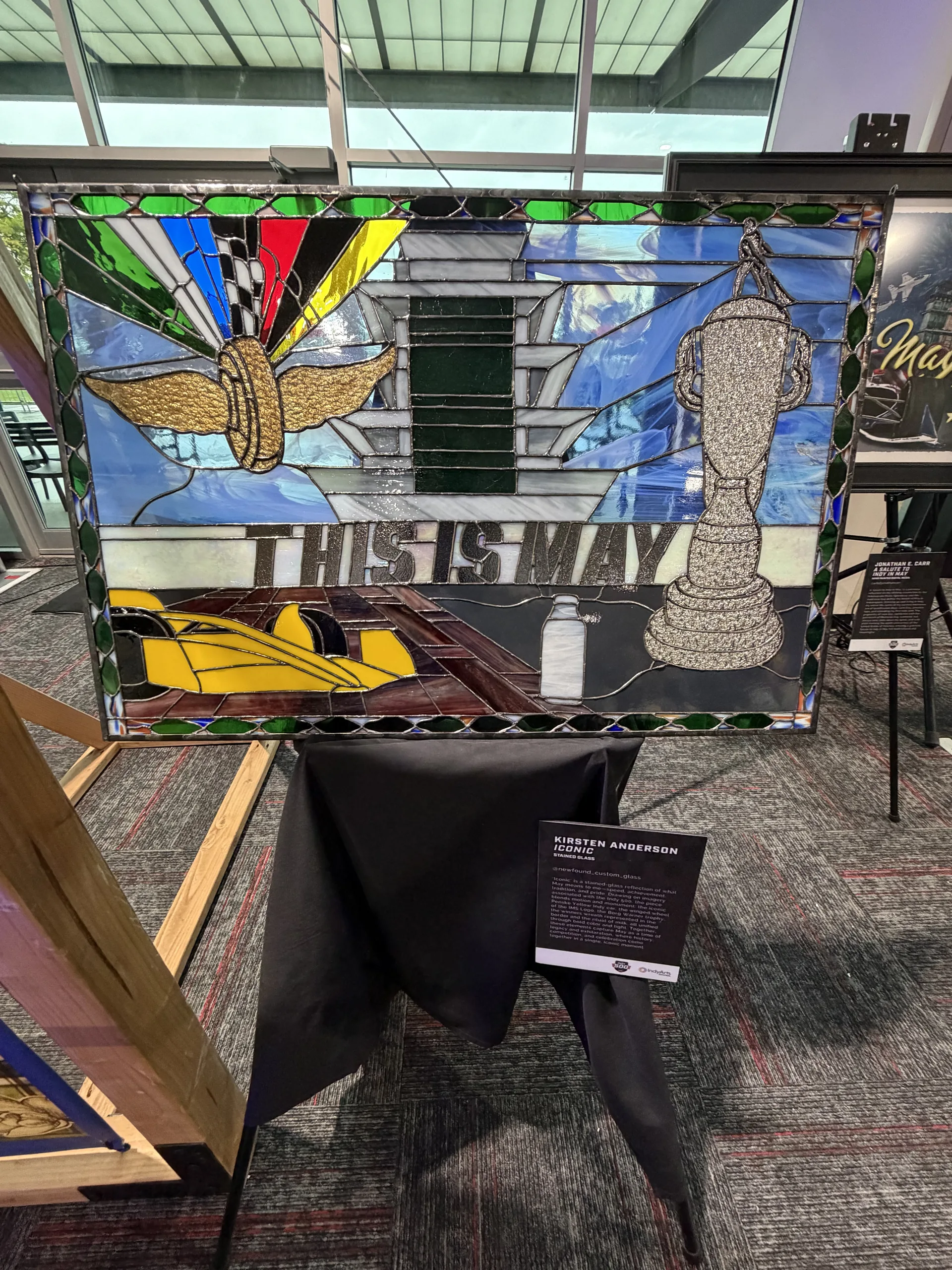 Indy 500 stained glass art piece by Kristen Anderson on display at the breakfast