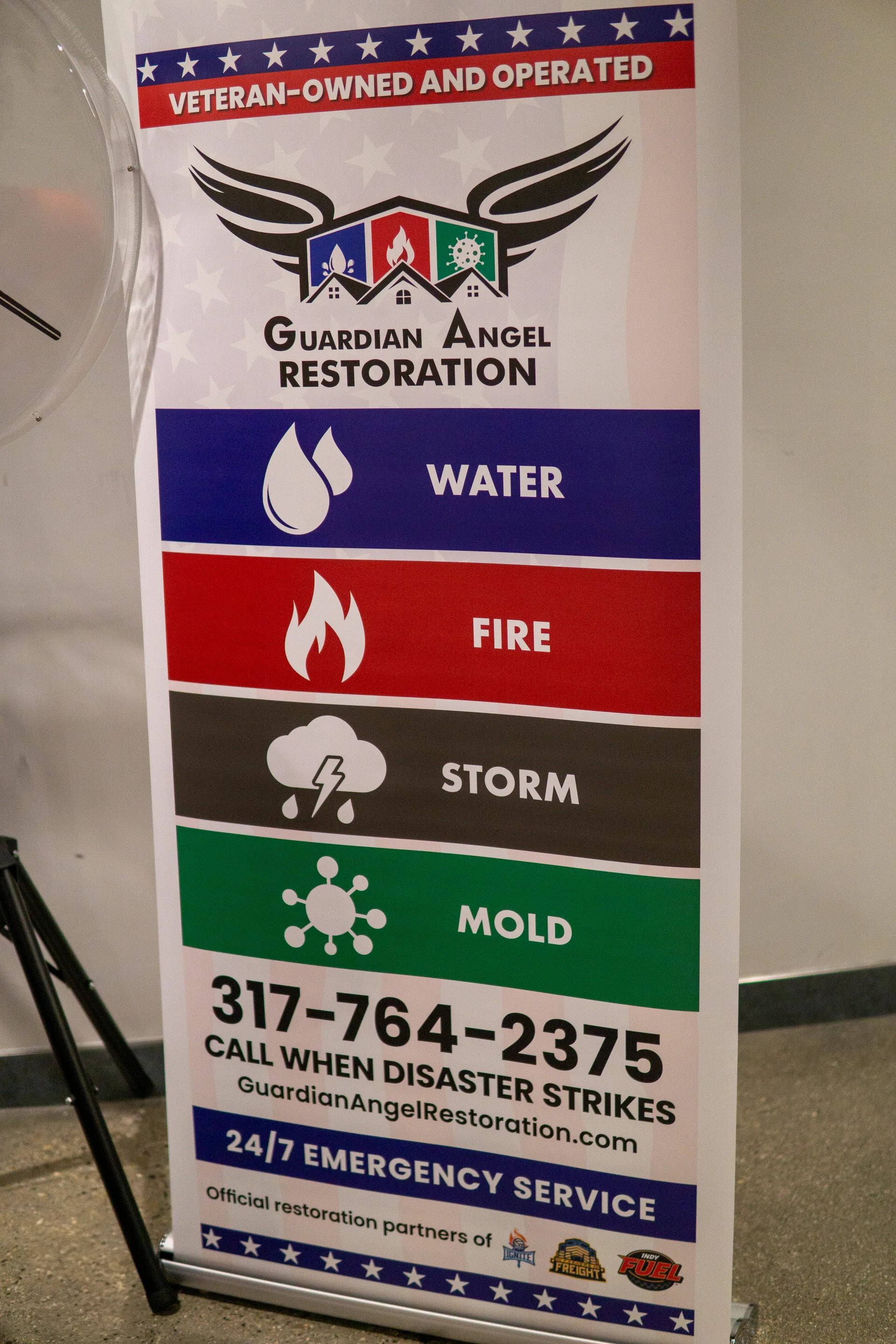 Guardian Angel Restoration veteran-owned banner showing Water, Fire, Storm, Mold services
