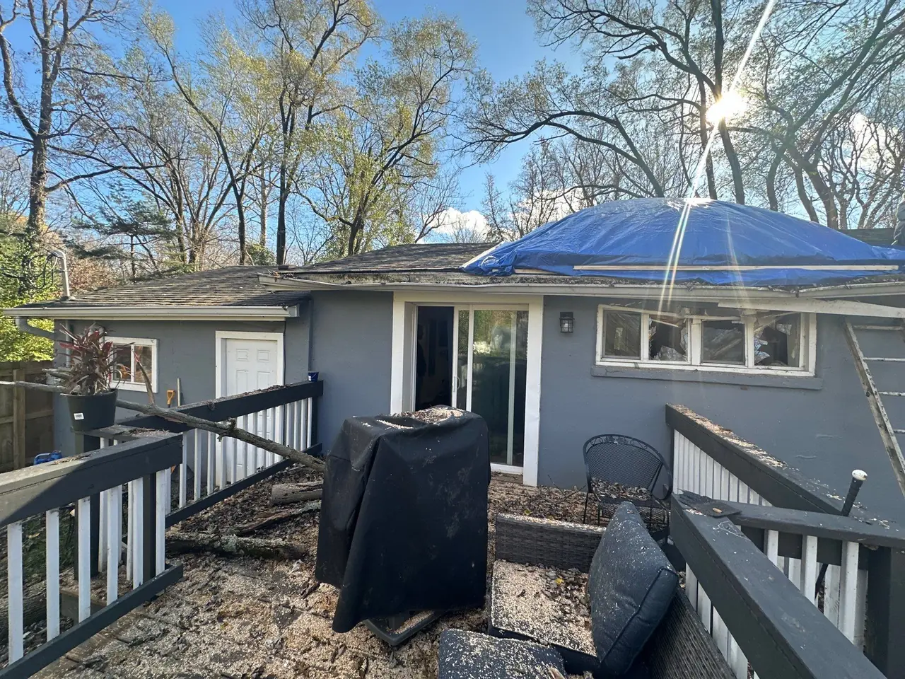 Guardian Angel Restoration emergency roof tarp installed over storm damage on a Hamilton County home