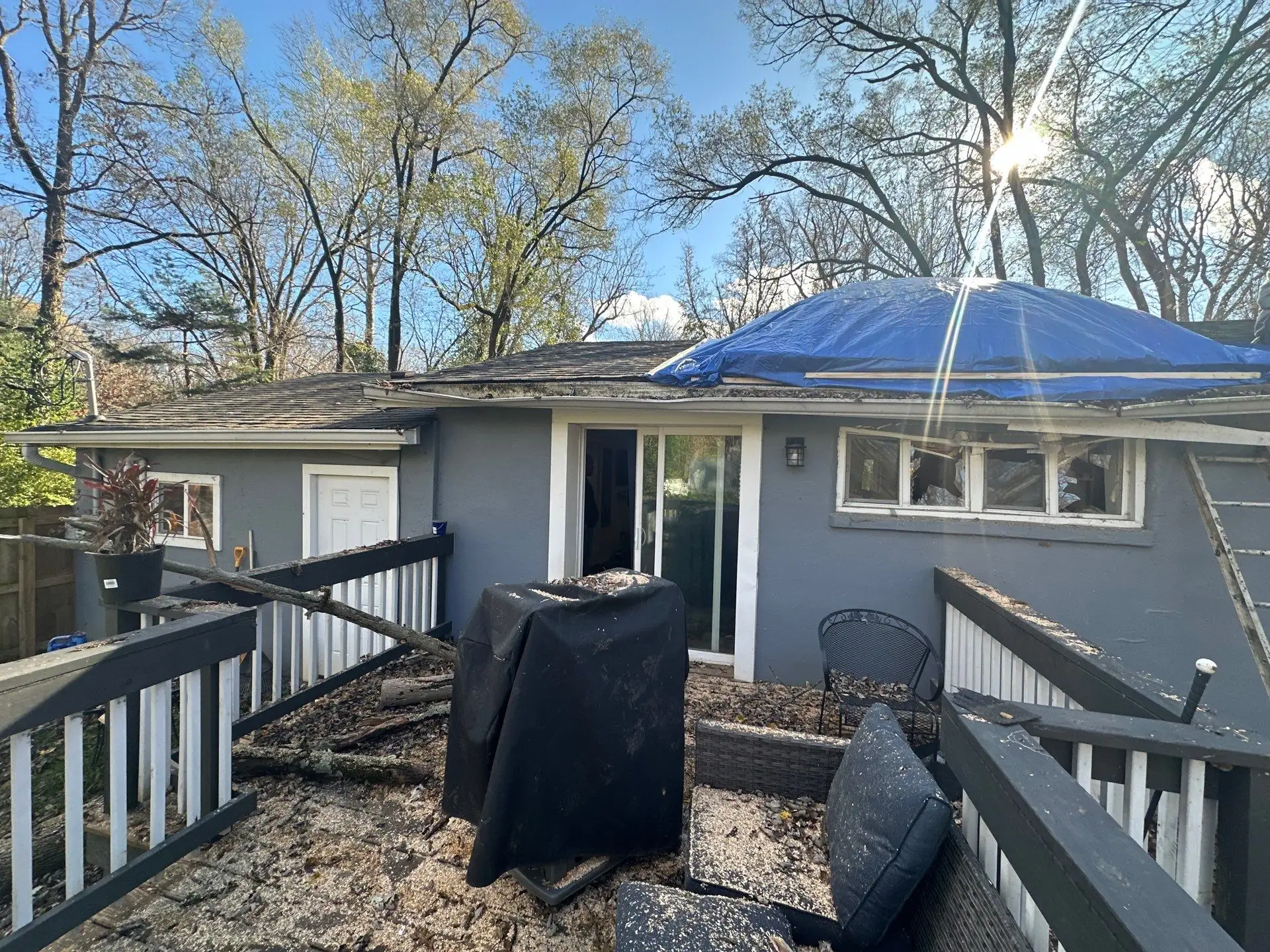 Guardian Angel Restoration emergency roof tarp installed over storm damage on a Hamilton County home
