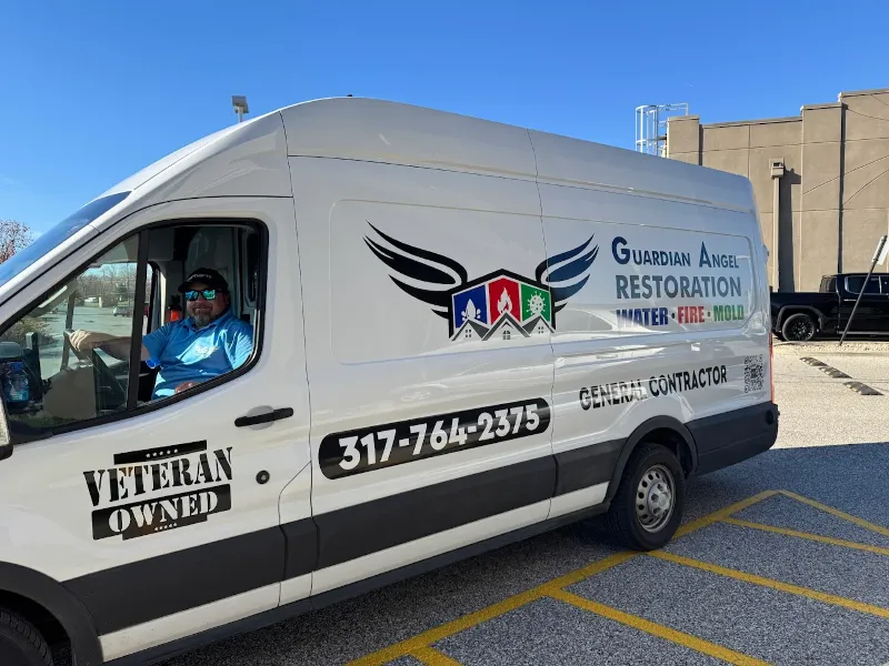 Guardian Angel Restoration branded service van on-site at a Hamilton County home during a 24/7 emergency response