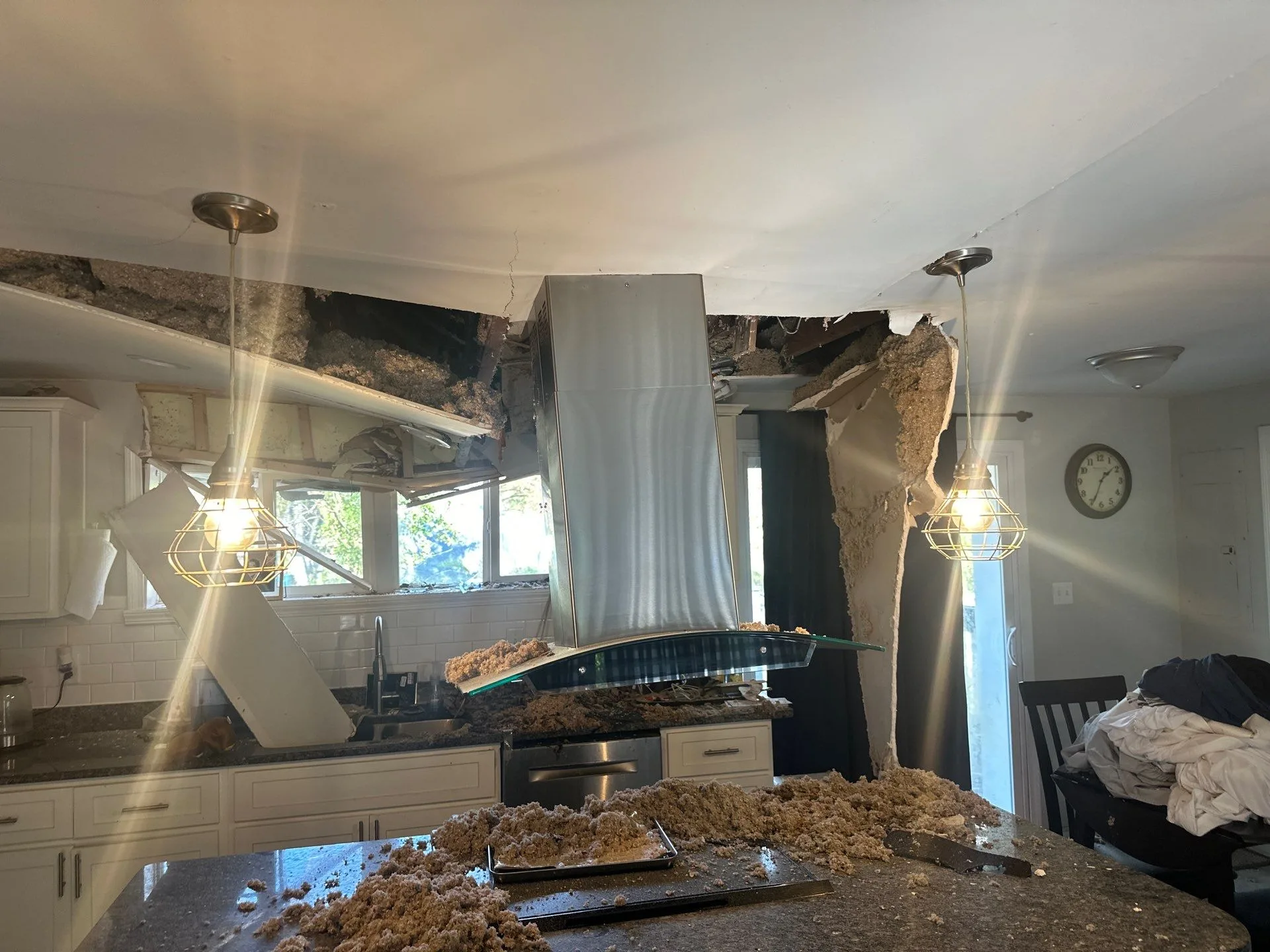 Roof leak ceiling collapse